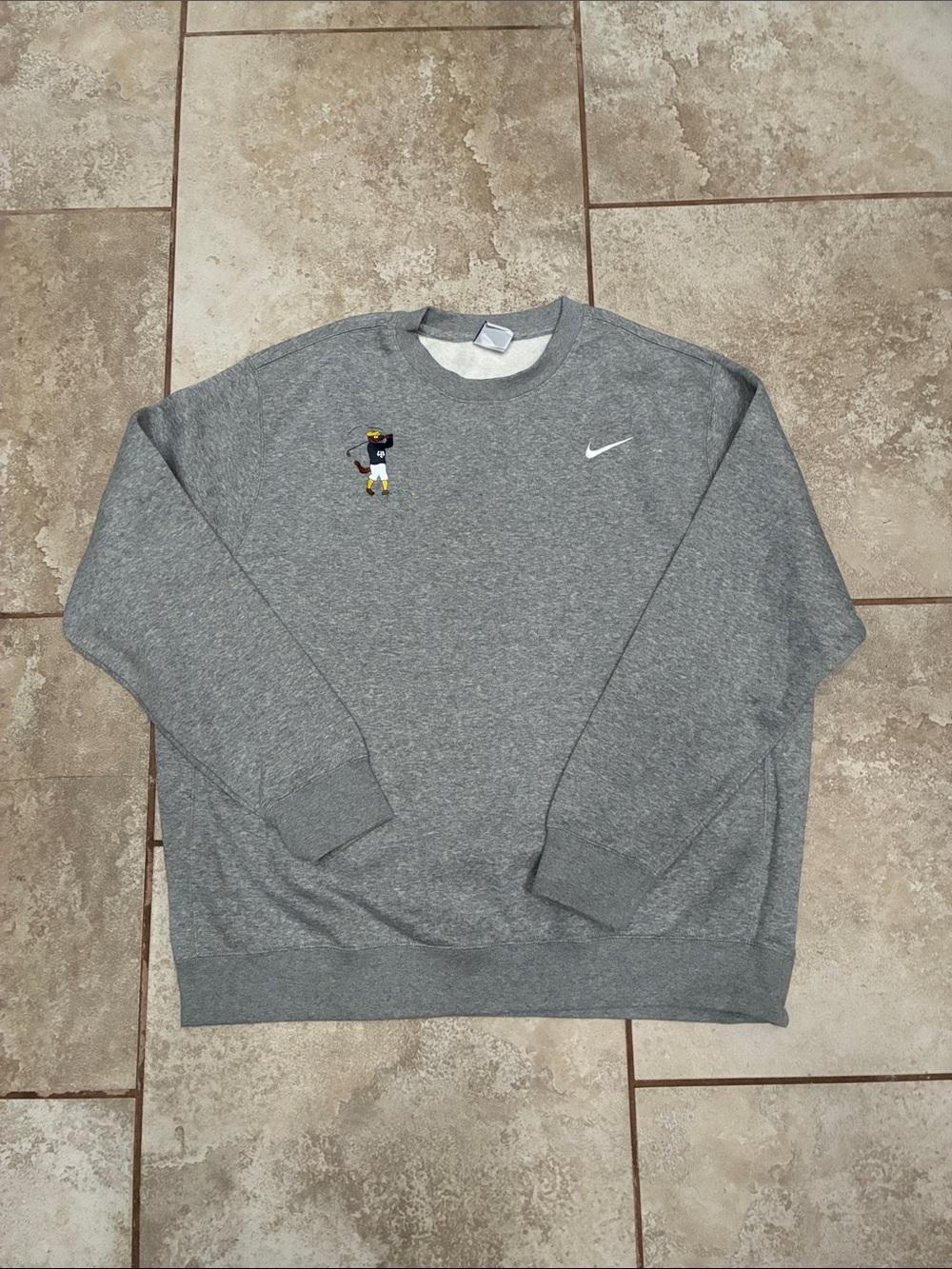 Nike Gray Crewneck Sweatshirt with Embroidered Character and White Swoosh Patch